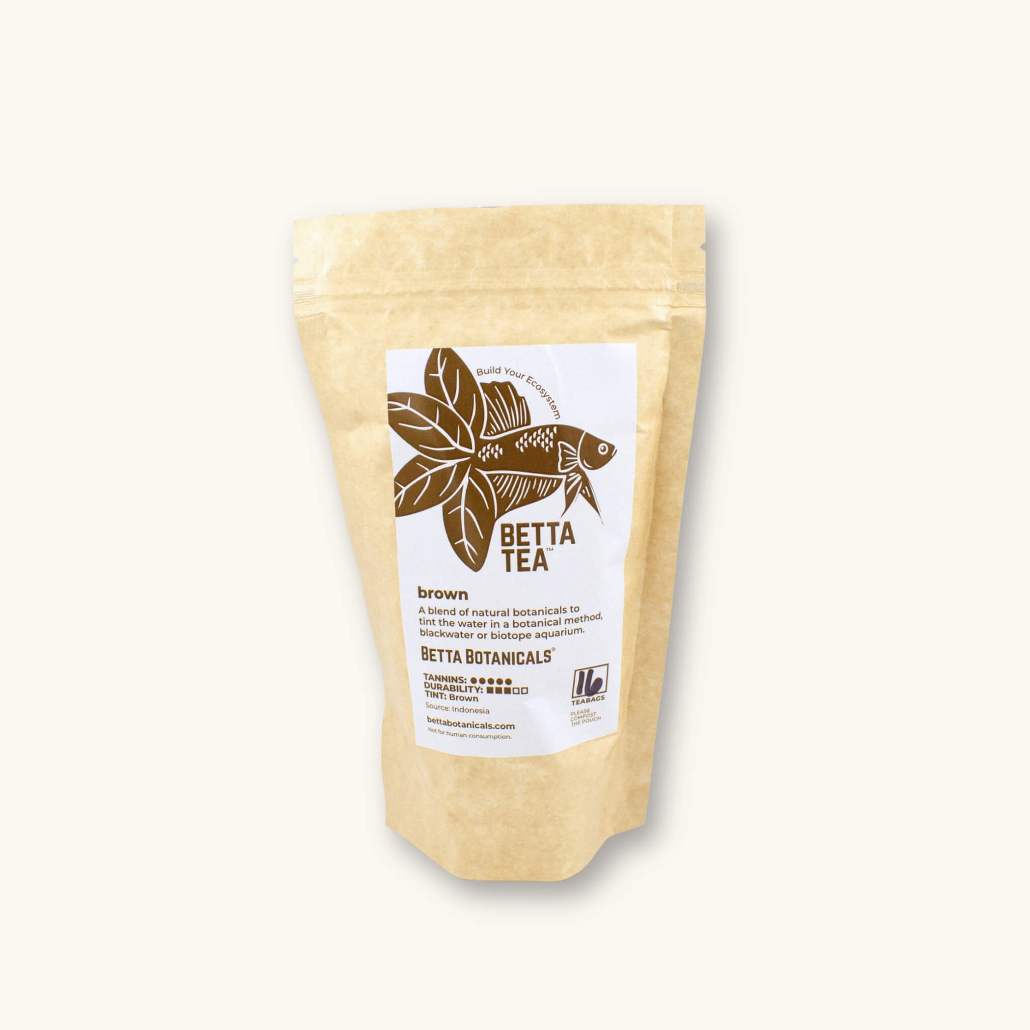 A kraft colored compostable pouch of 16 brown tinting tea bags, photographed against a natural background at Betta Botanicals.