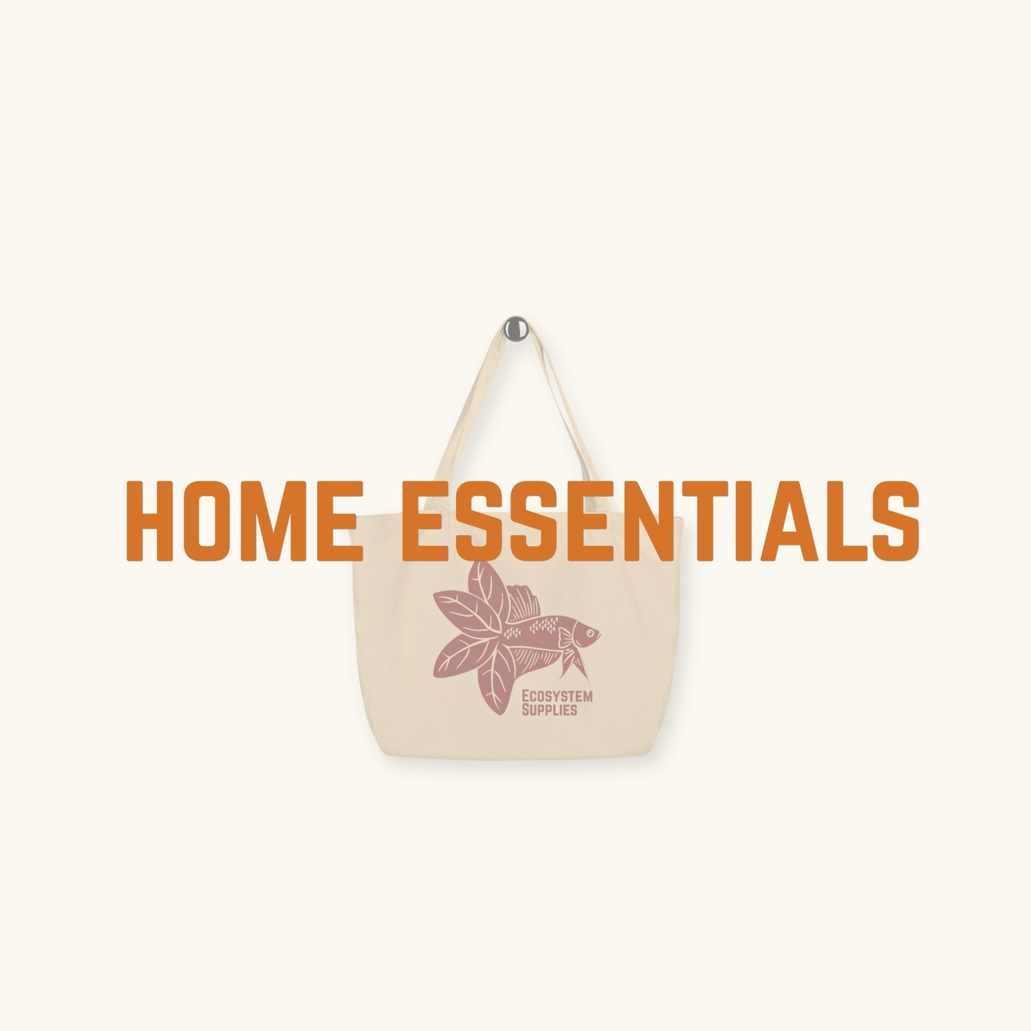 A tan tote bag with the betta botanicals logo on it, photographed on a natural background.