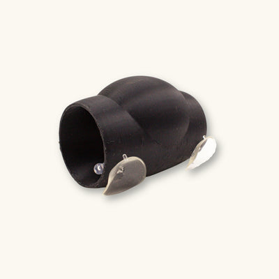 A single black 3D printed bubble nest holding tube for betta fish spawning, photographed on a natural background at Betta Botanicals.