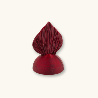 A maroon betta fish flare mirror, 3D printed and photographed on a natural background.