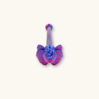 A single betta fish flare stick in a two tone blue and purple color, 3D printed and photographed on a natural background.