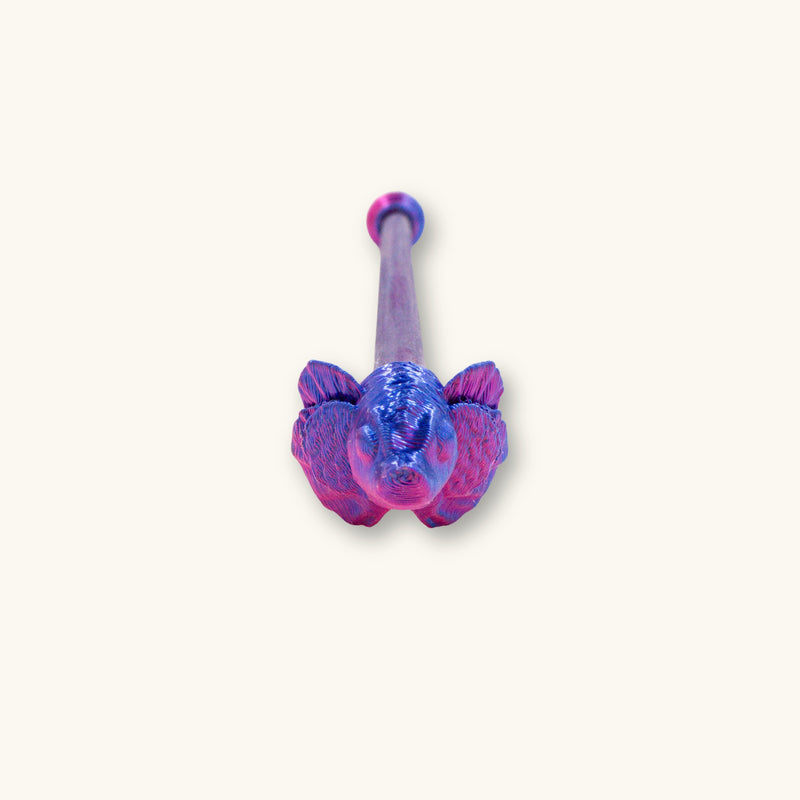 A single betta fish flare stick in a two tone blue and purple color, 3D printed and photographed on a natural background.