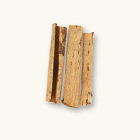 A collection of brown catappa bark curls (Terminalia catappa) for blackwater aquariums, photographed on a natural background at Betta Botanicals.