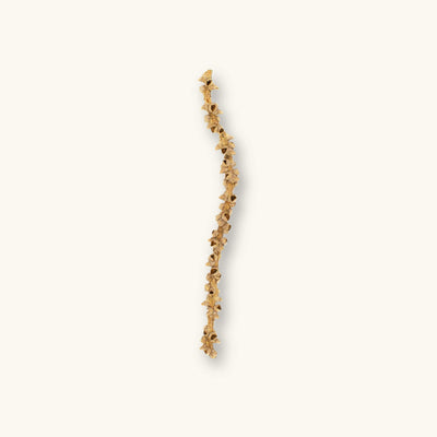 Brown and beige fishtail palm stems (Caryota mitis) with acorn-like textures for blackwater aquariums, photographed on a natural background at Betta Botanicals.