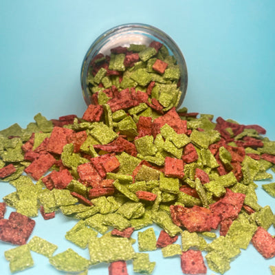 A pile of KatsAquatics shrimp food by Betta Botanicals, for aquarium shrimp and snails.