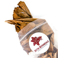 Pile of brown and crinkled banana leaves in clear sustainable packaging for aquariums by Betta Botanicals.