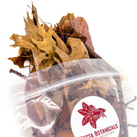 Pile of aquarium botanicals from a variety pack by Betta Botanicals, containing twigs, leaf litter, cones, and seed pods.
