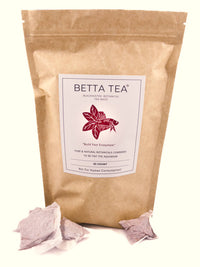 A compostable tan bag of Betta Tea aquarium tannins with three betta tea bags for aquariums by Betta Botanicals.