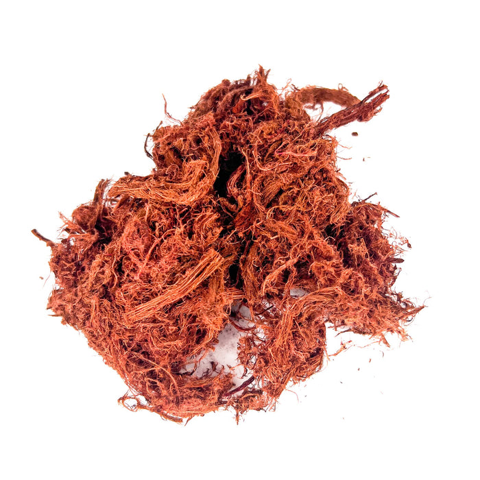 Pile of red and fibrous thai cutch tree bark for aquariums and terrariums by Betta Botanicals.